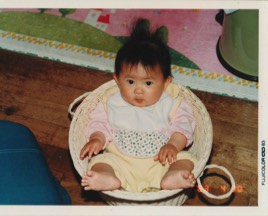 Akari, baby in a basket